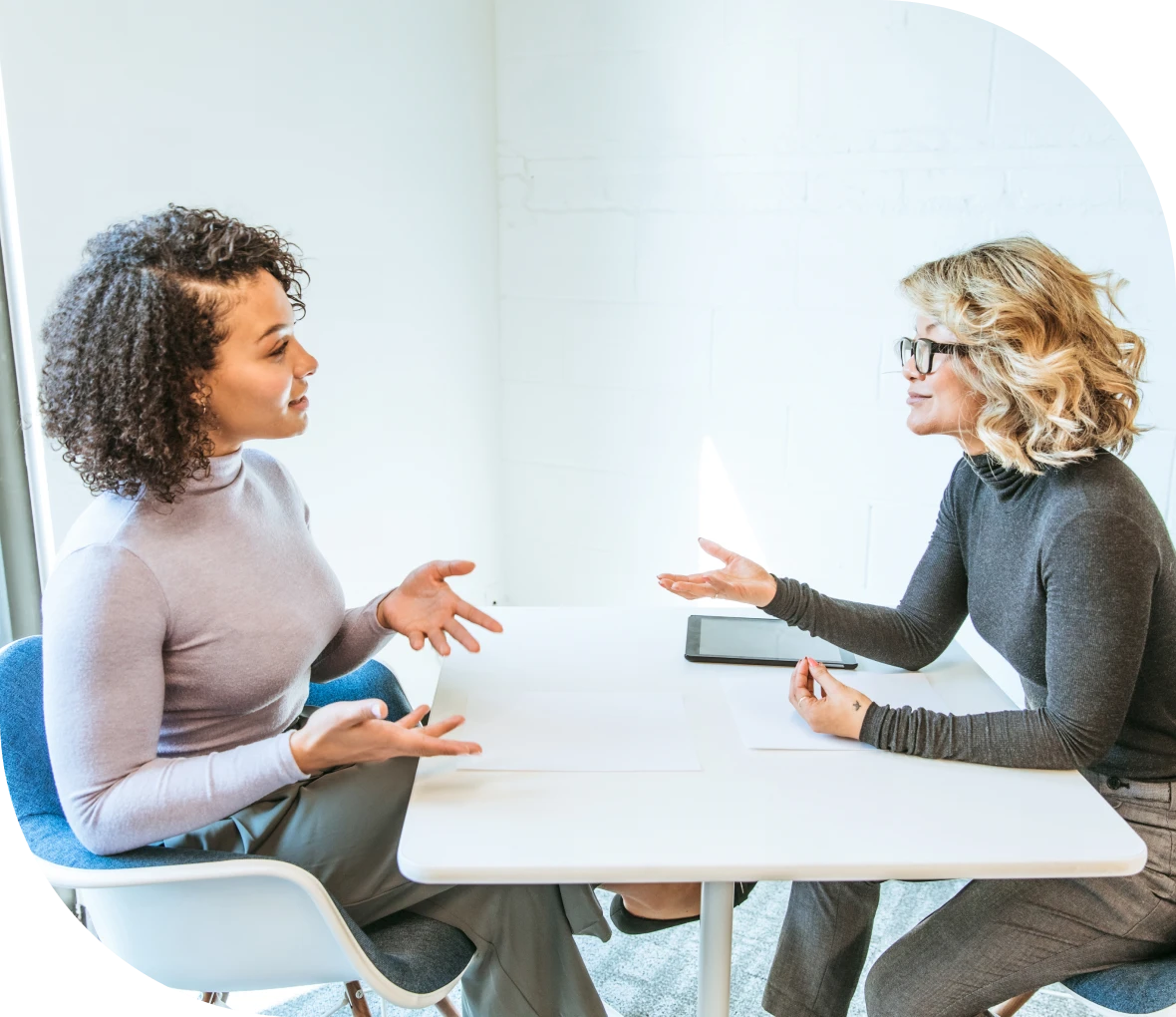Business meeting between two women.
