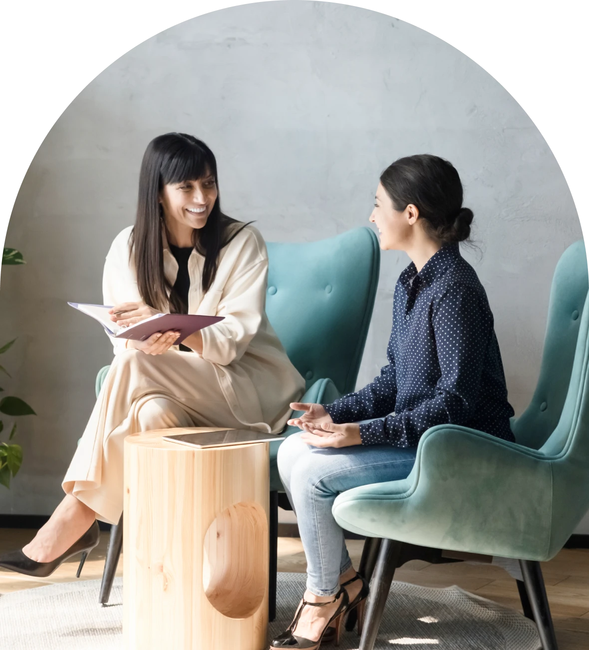 Women discussing in a modern setting